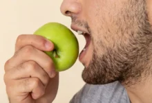 a person eating an apple