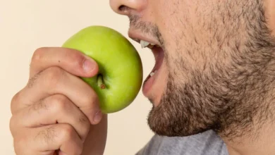 a person eating an apple